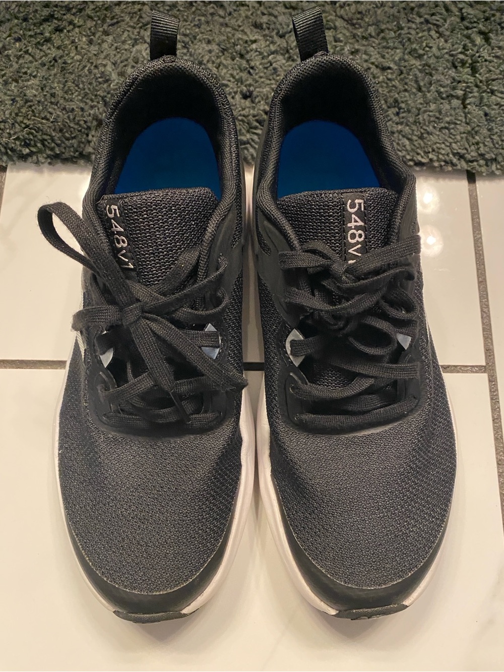 Women’s size 9 New Balance 548VI Black Athletic Sneakers with White Soles